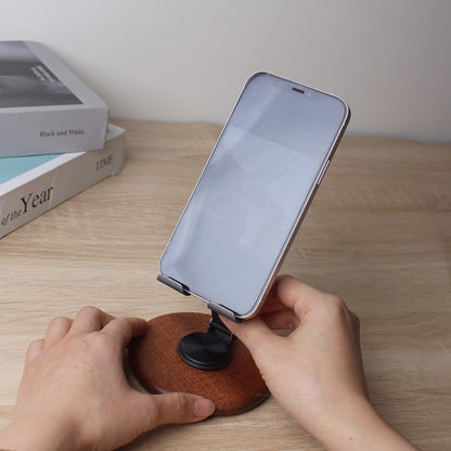 The new solid wood desktop mobile phone holder rotates 360 degrees, and the live broadcast is lazy and convenient to fold. Universal mobile phone holder