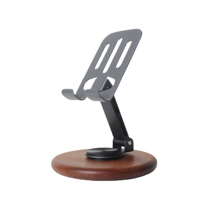 The new solid wood desktop mobile phone holder rotates 360 degrees, and the live broadcast is lazy and convenient to fold. Universal mobile phone holder