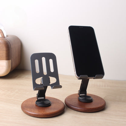The new solid wood desktop mobile phone holder rotates 360 degrees, and the live broadcast is lazy and convenient to fold. Universal mobile phone holder